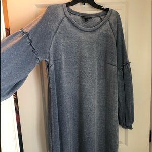 The perfect dress.  Falls just above the knee.